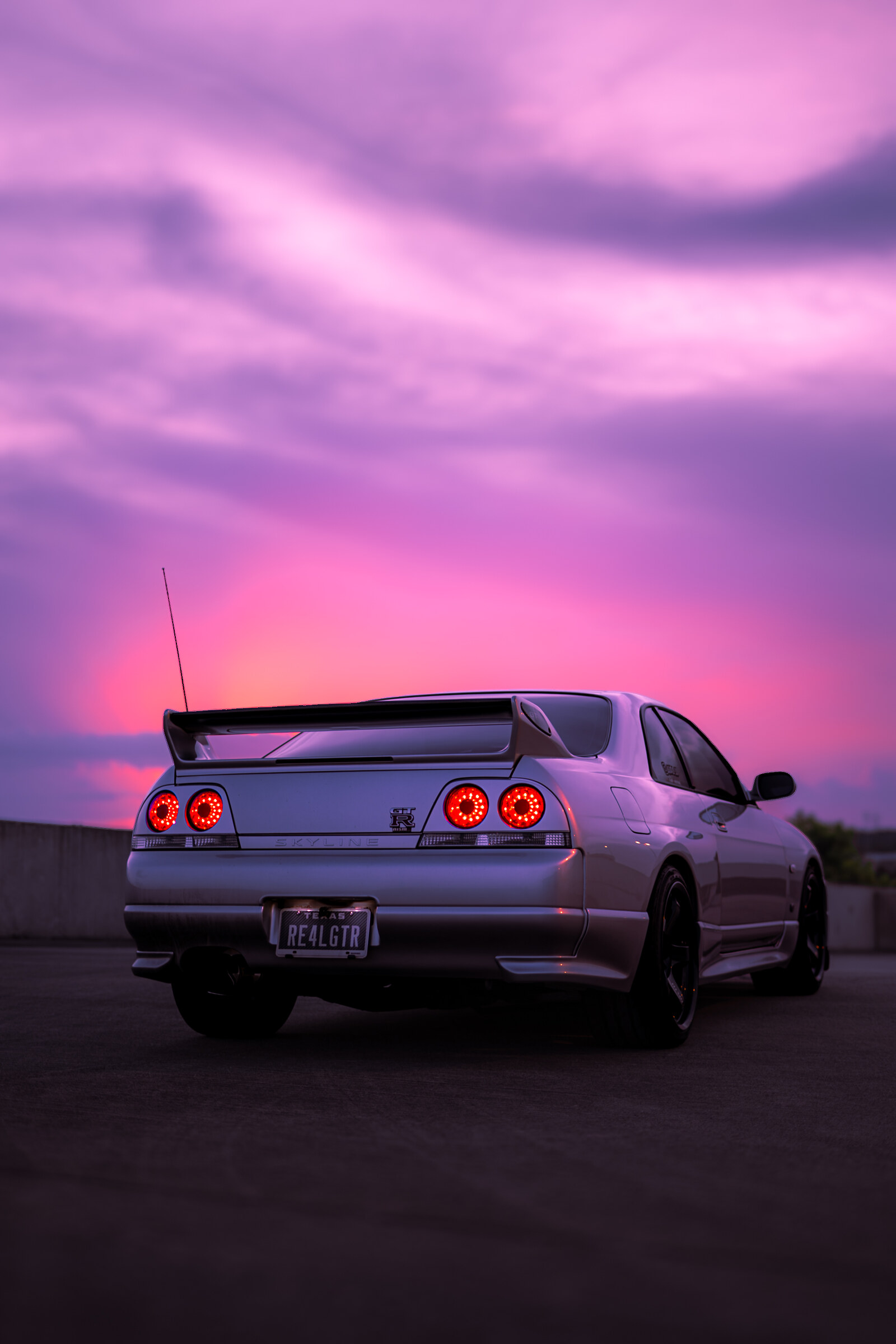 GT-R silver at purple sunset
