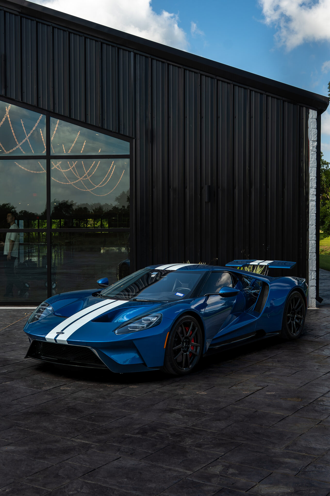 Blue Ford GT racing stripes