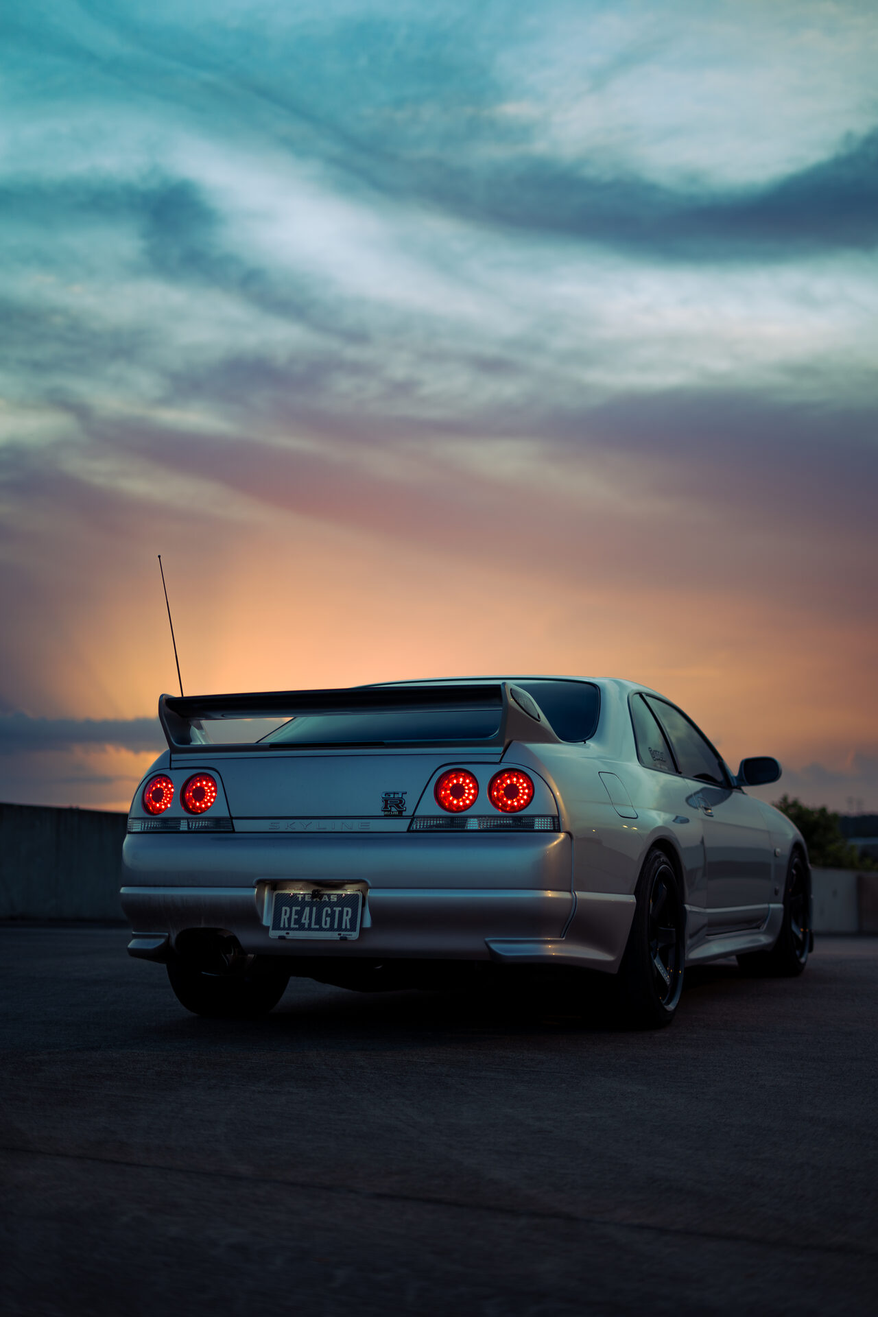 Nissan GTR rear spoiler moody sunset