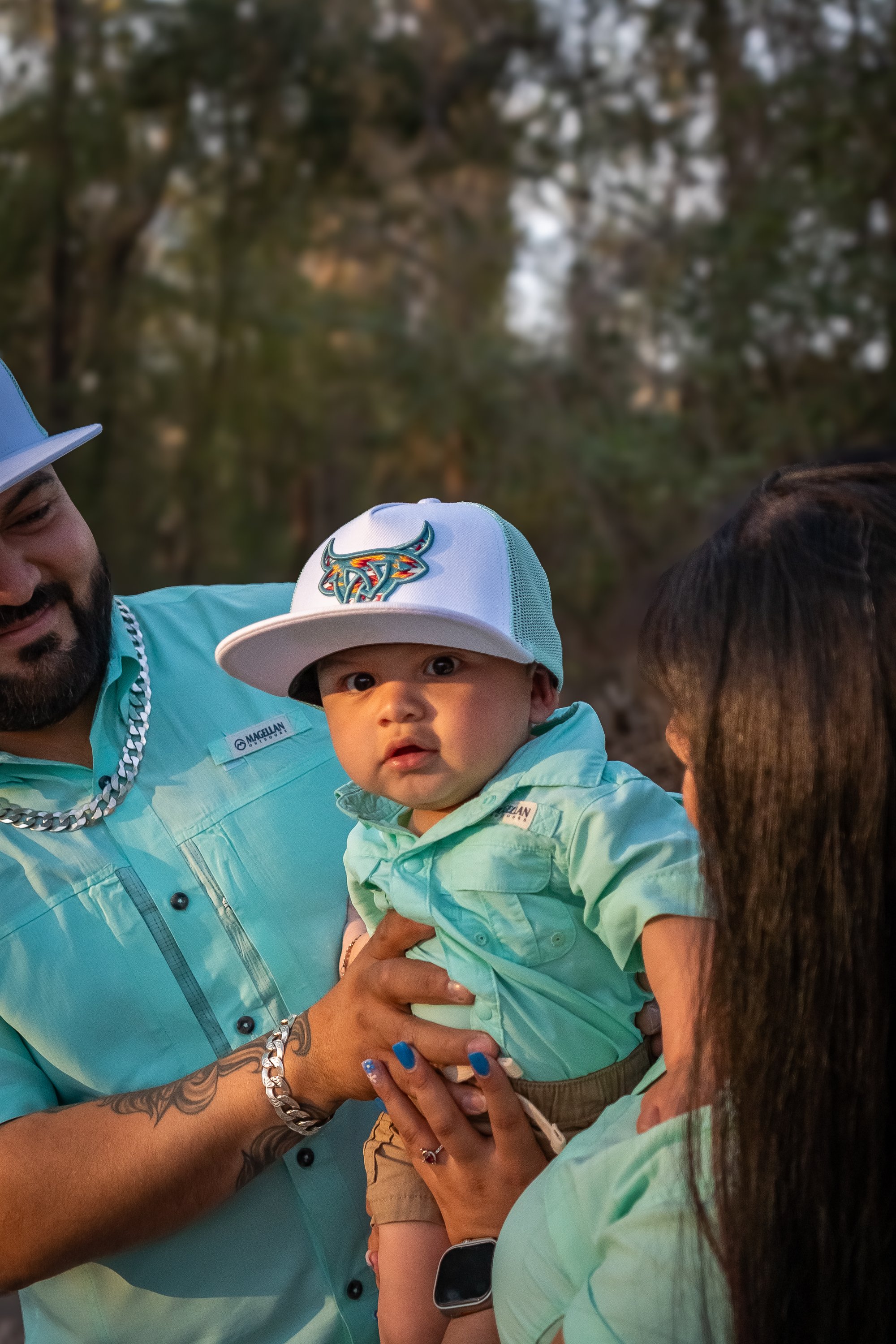 Father and baby in matching outfits