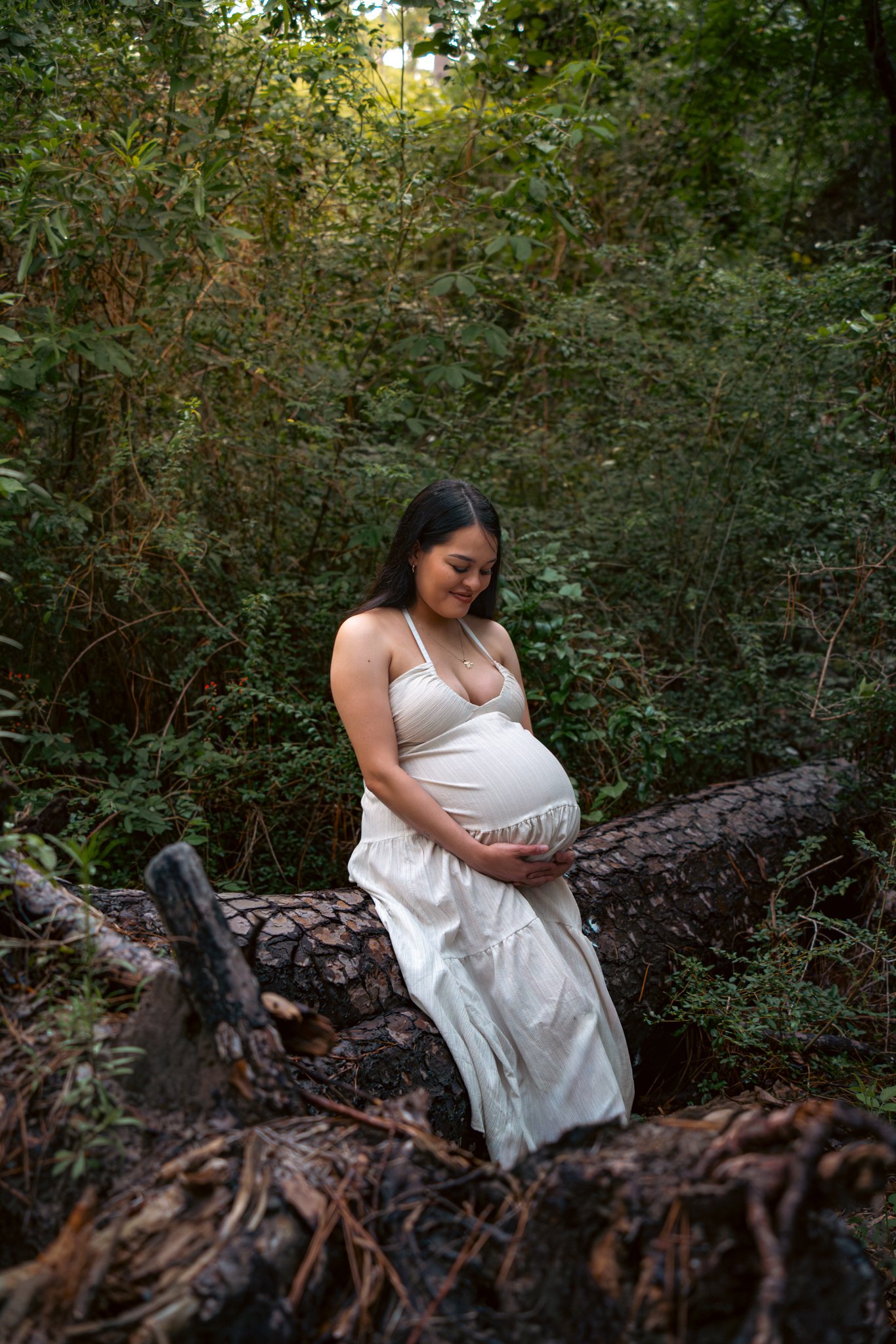 Maternity portrait in forest setting